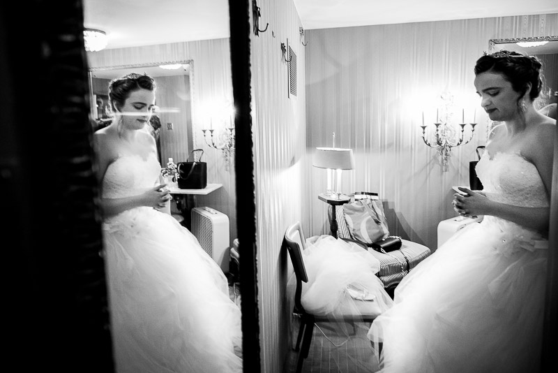 Barbara the bride pensively waits in bridal room at Margarite B. Parker Chapel
