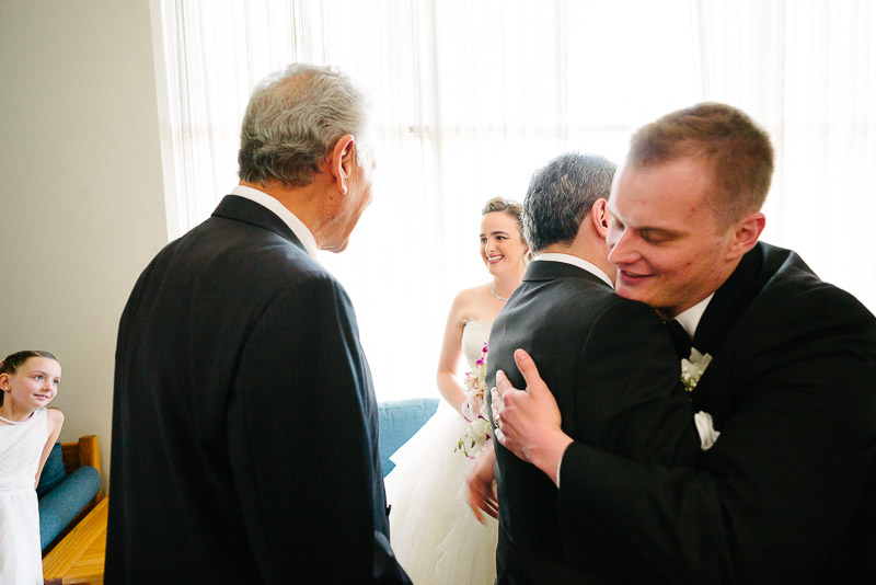 Hugs and kisses after wedding ceremony Margarite B. Parker Chapel