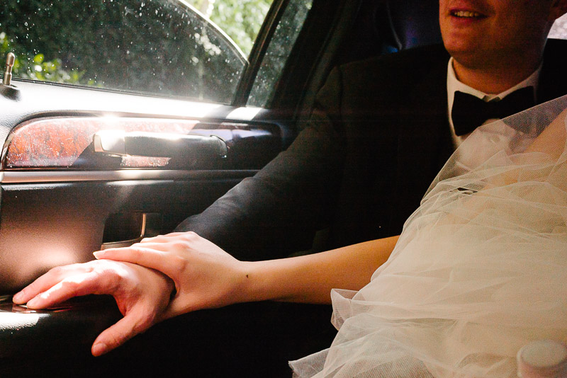 Holding hands in limo