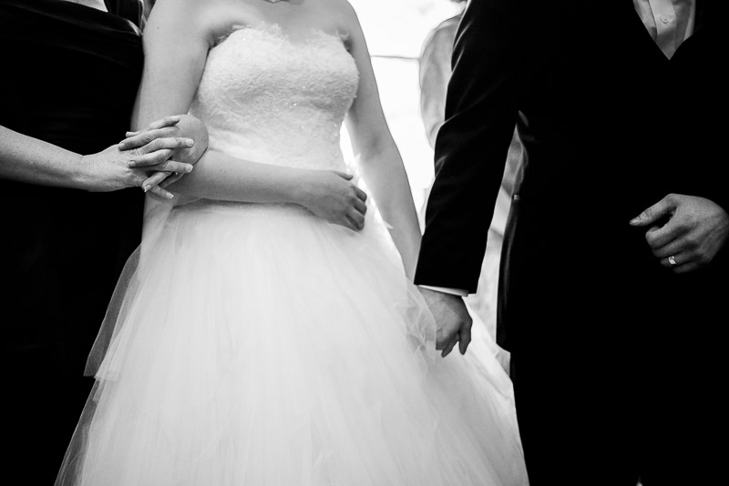 Mother, bride and groom hold hands The Westin Riverwalk, San Antonio, Texas