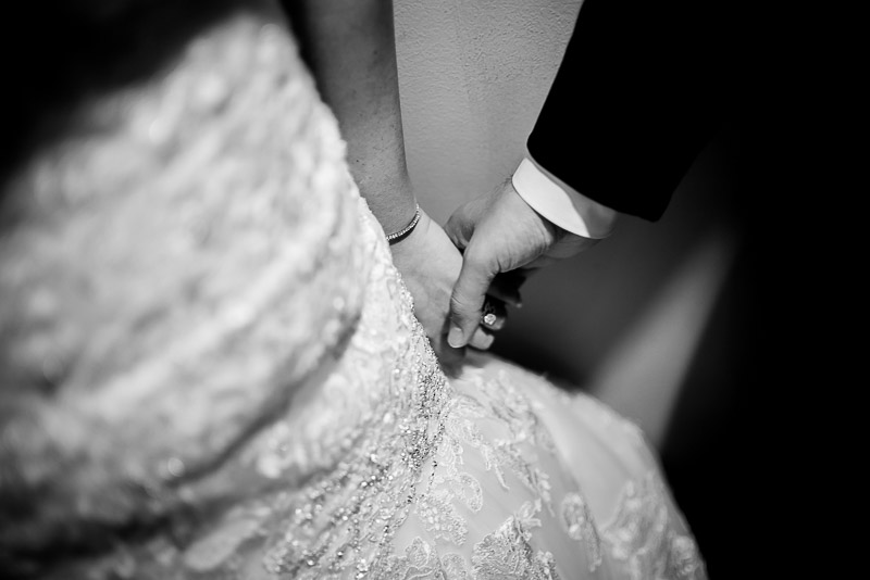 Holding hands at San Fernando Cathedral, San Antonio, Texas