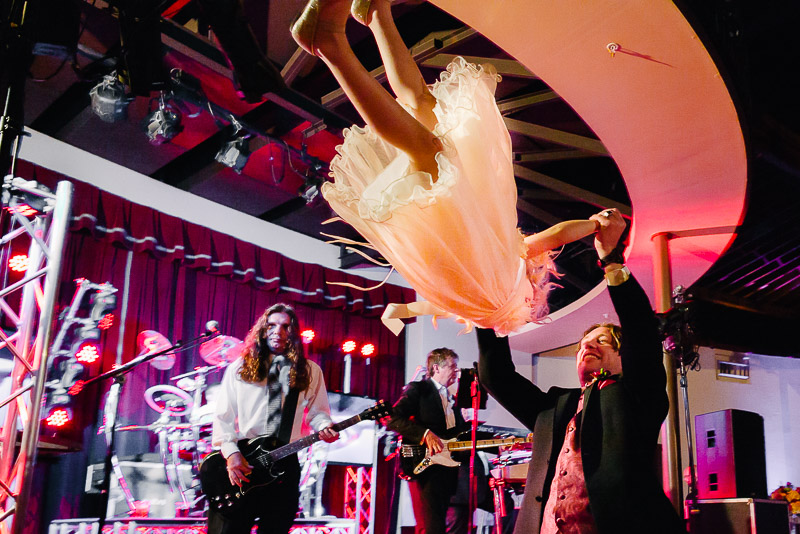 Flower girl dancing with father at Pearl Brewery, San Antonio, Texas