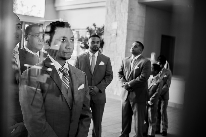 Groom stands looking ready at Spring wedding St Anthony + Los Encinos-Wedding photographer-Philip Thomas-12