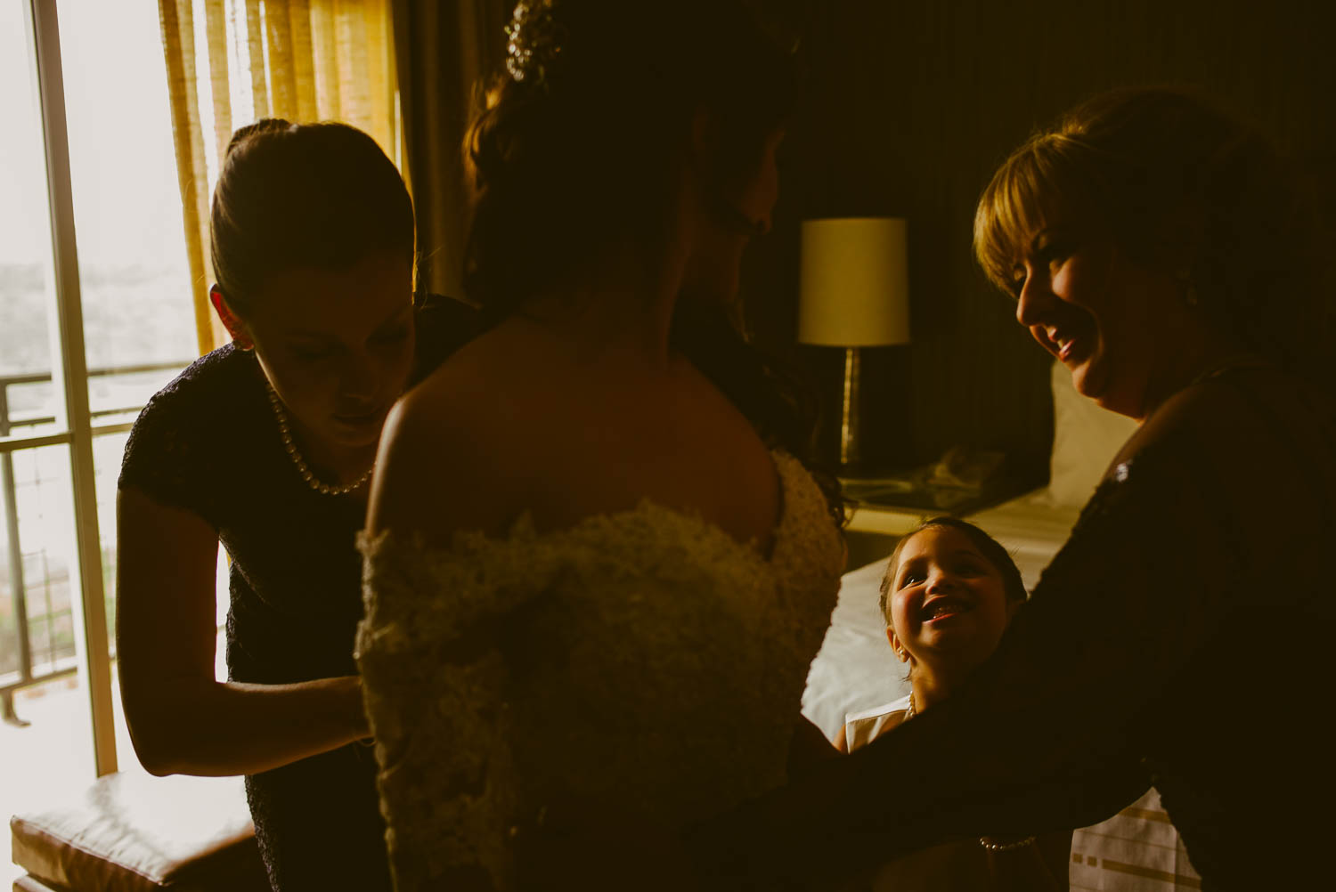 Bride getting dressed with mother of the bride at la cantera resort san antonio texas