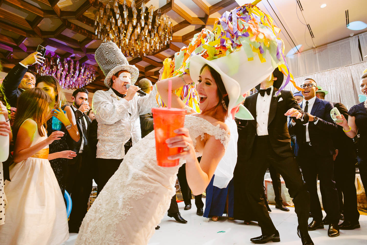 Bride celebrates doing the limbo at la-cantera-resort-wedding-photographer-philip-thomas-079