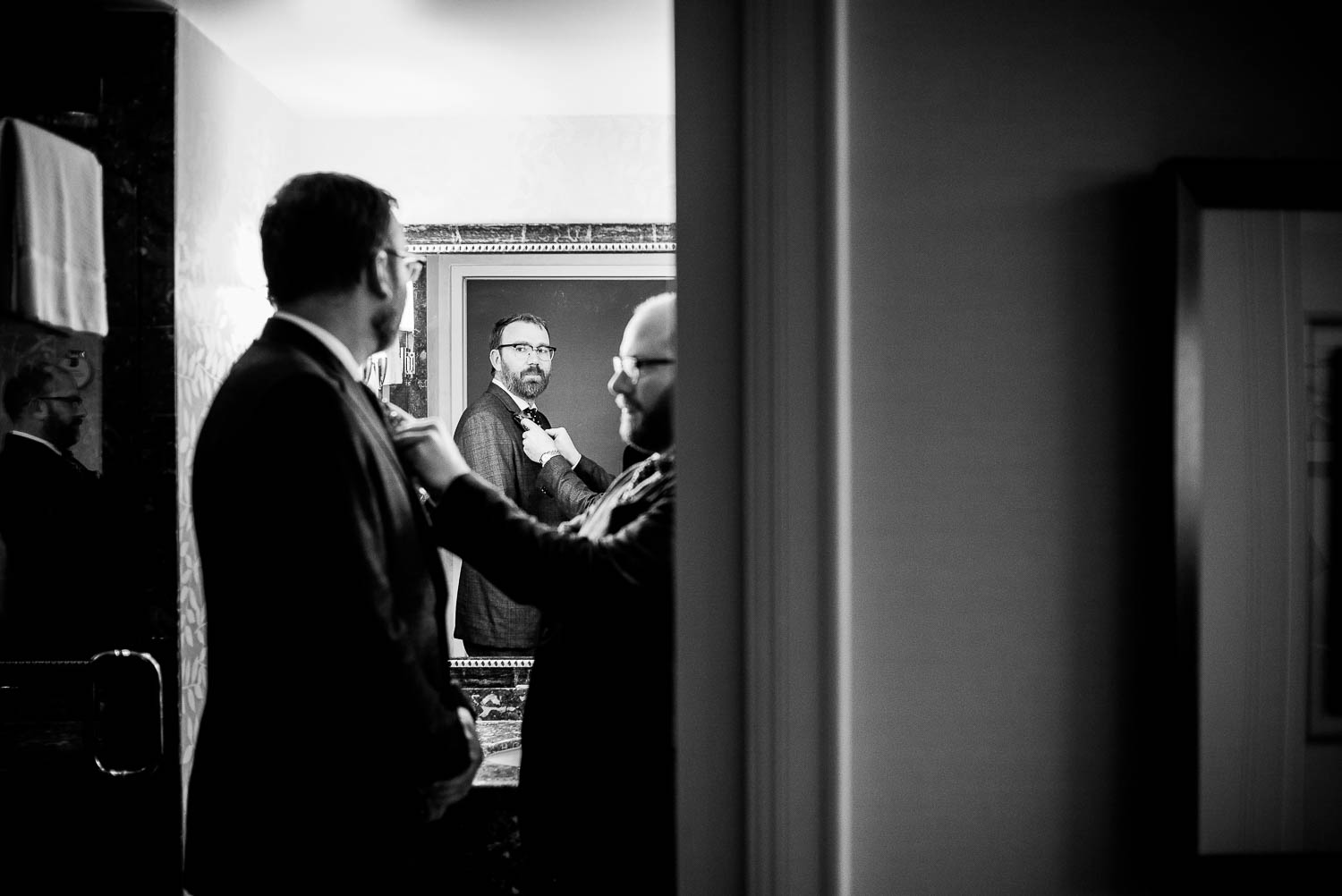 LGBTQ and gay wedding Groom checks other grooms tie same-sex-wedding-marina-del-rey-marriott-los-angeles-leica-wedding-photographer-philip-thomas-013