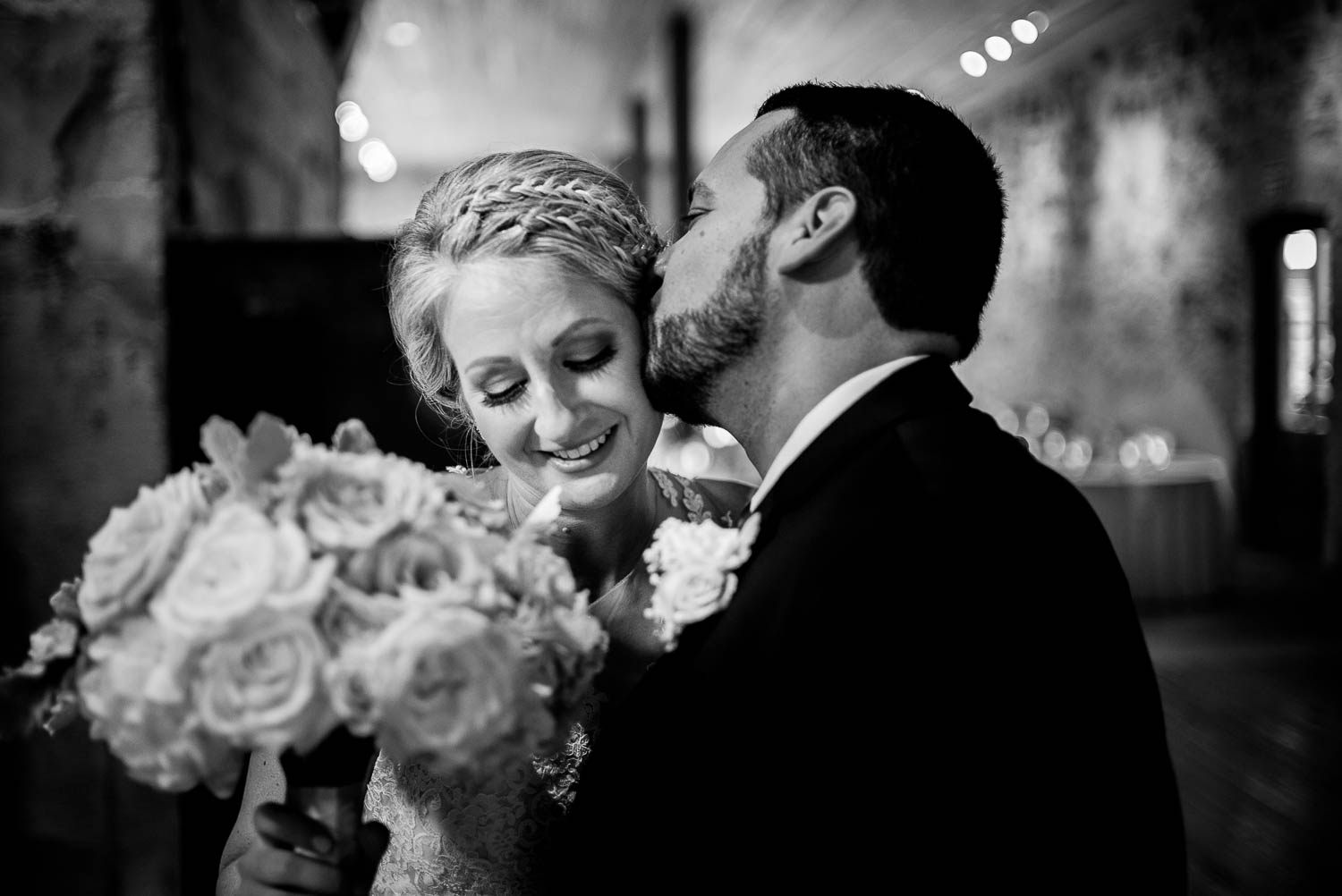 Just married couple groom kisses bride ingenhuett-on-high-wedding_leslie_omar-leica-wedding-photographer-philip-thomas