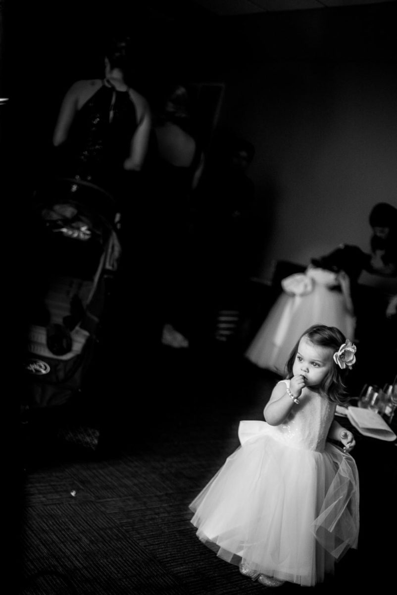 Flowergirls walks into shot at san-antonio-la-cantera-resort wedding San Antonio Texas