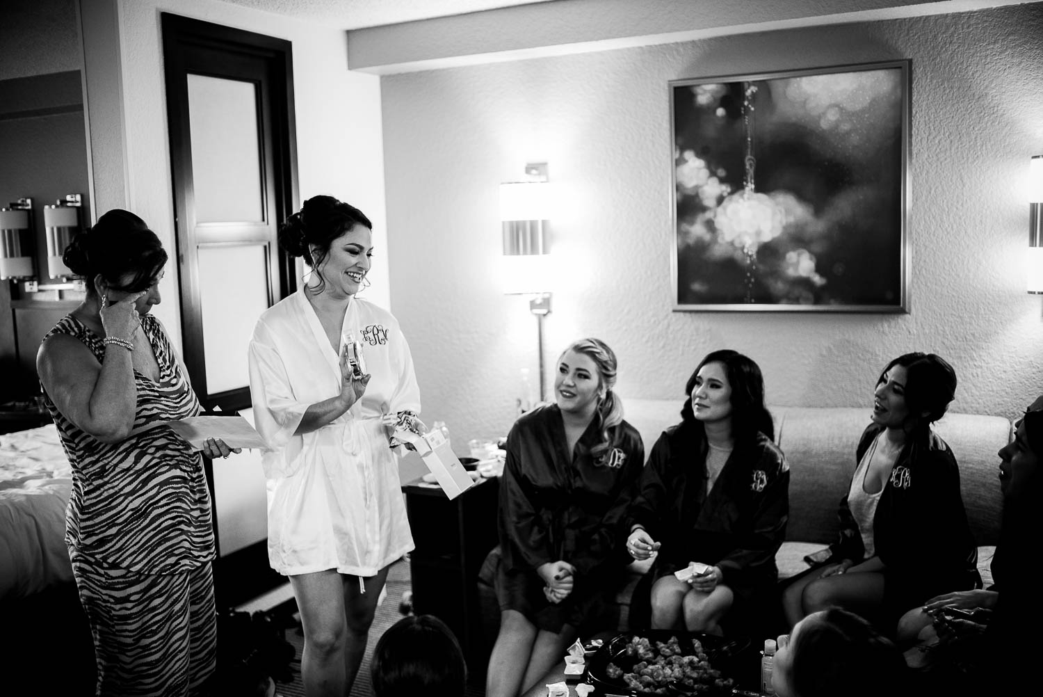 Bride opens gifts with friends at Hyatt Place hotel san antonio texas