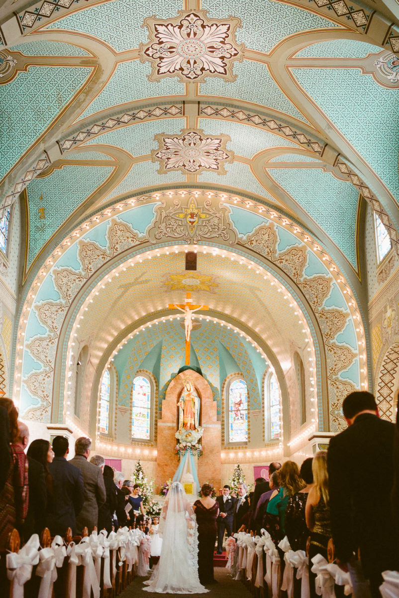 Wide angle of a wedding ceremony at immaculate-heart-of-mary-church-philip-thomas-photography