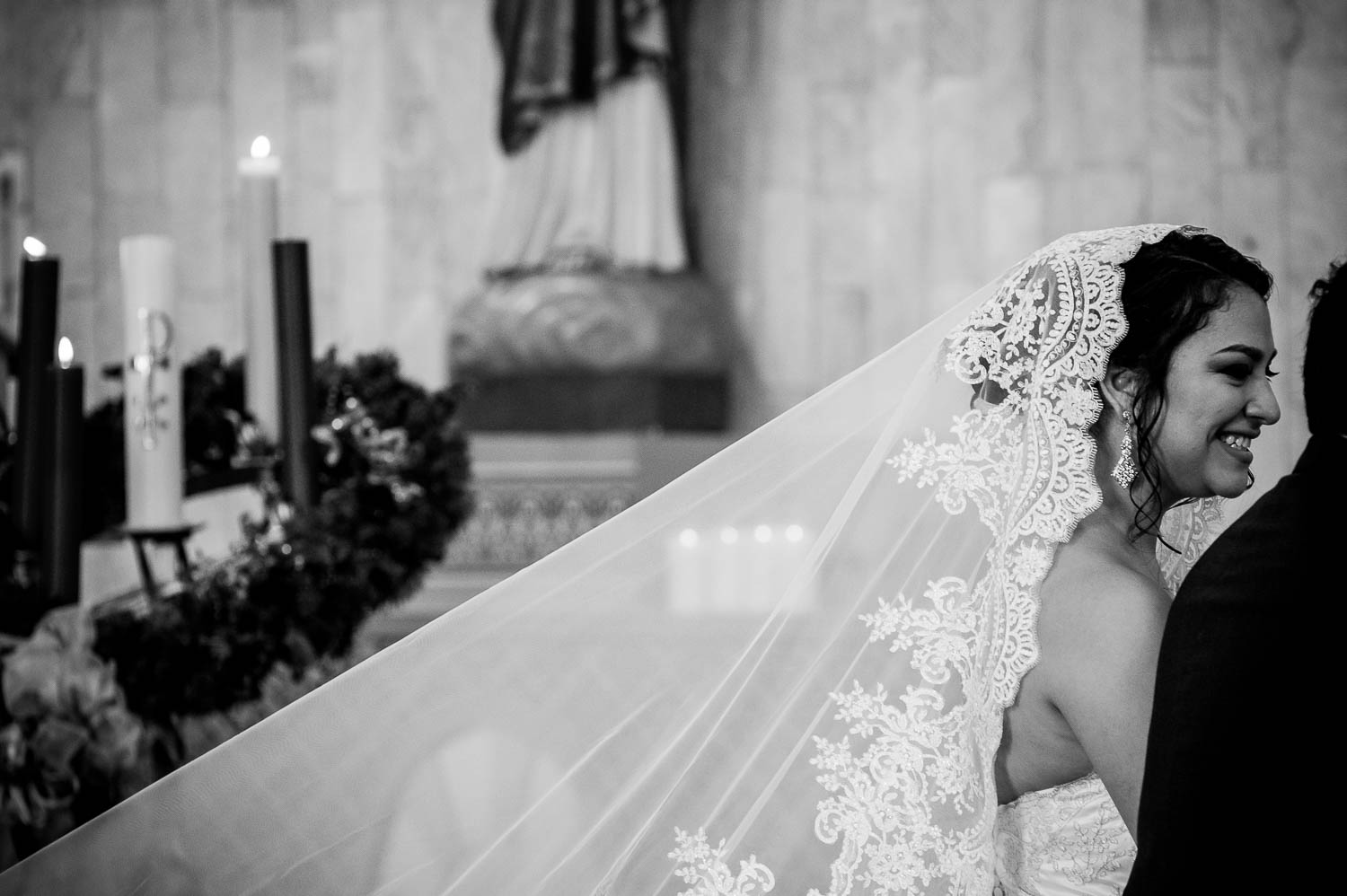 Brides veil at full stretch at immaculate-heart-of-mary-church-philip-thomas-photography