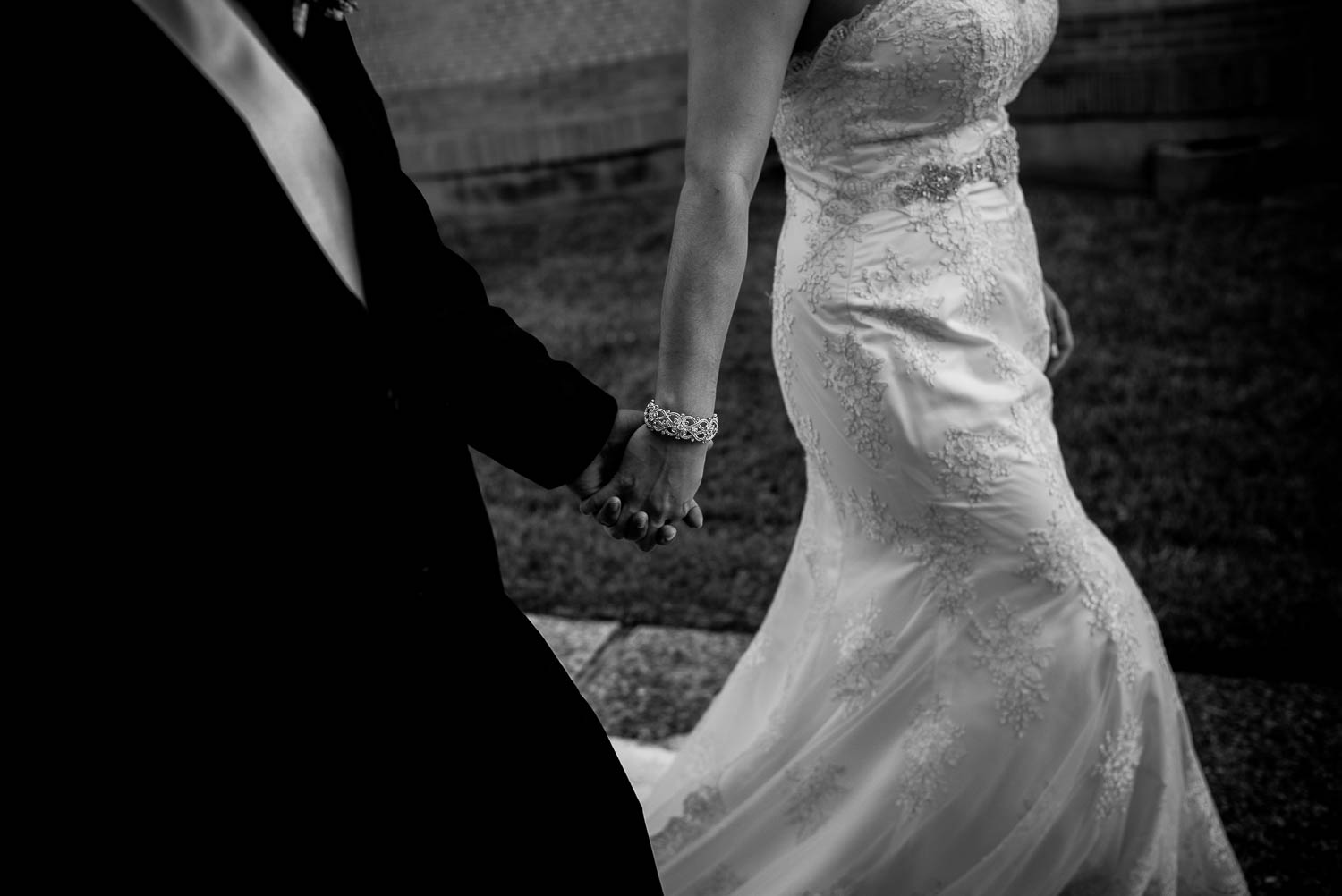 Couple holding hands at immaculate-heart-of-mary-church-philip-thomas-photography