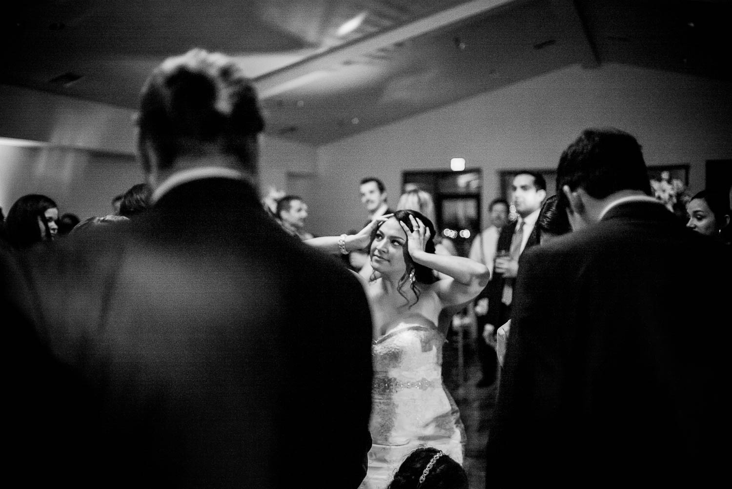 Bride holding hands to head during a dance wedding reception Granberry Hills Wedding, Philip Thomas Photography