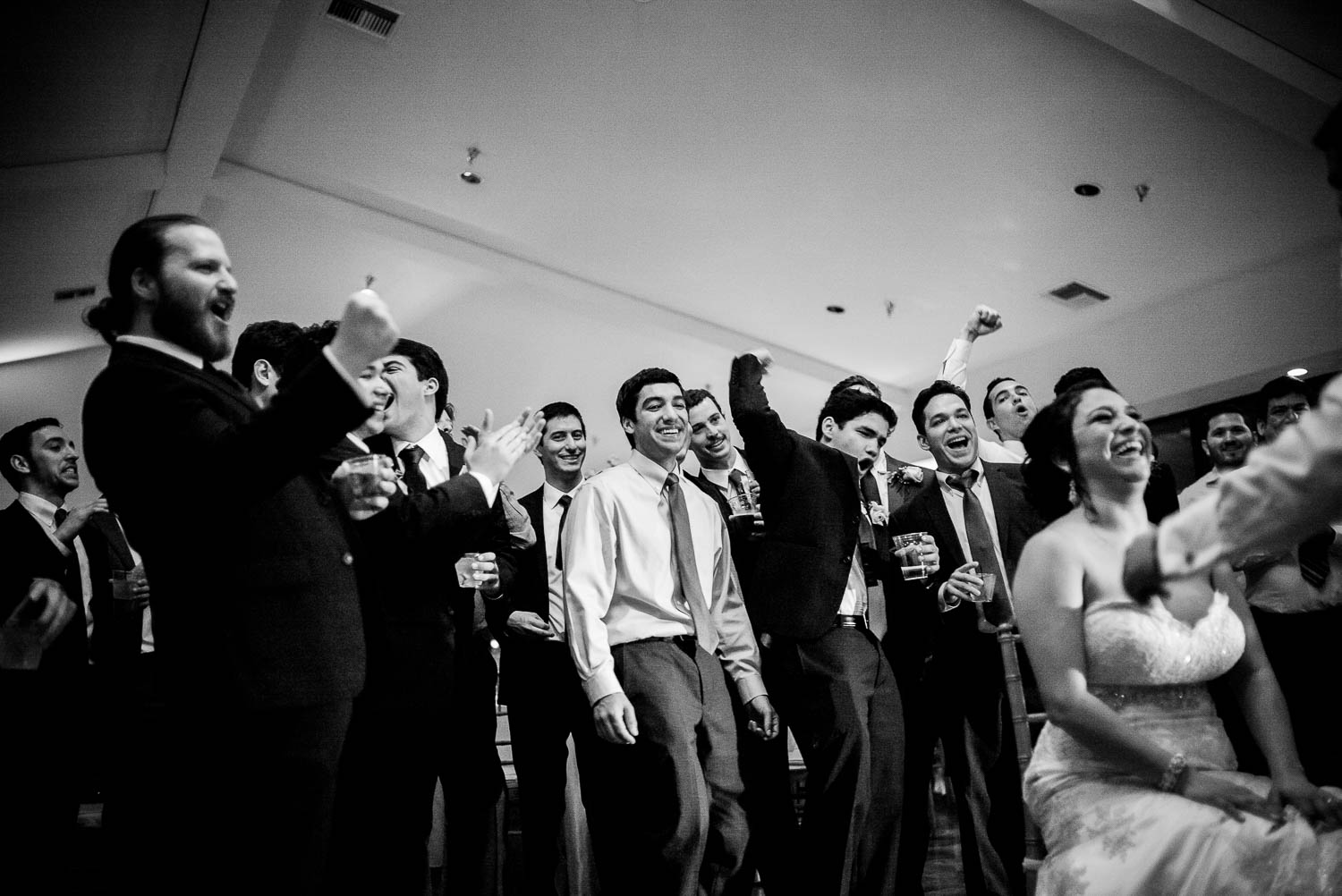 Male guests whoop and holler at groom wedding reception Granberry Hills Wedding, Philip Thomas Photography