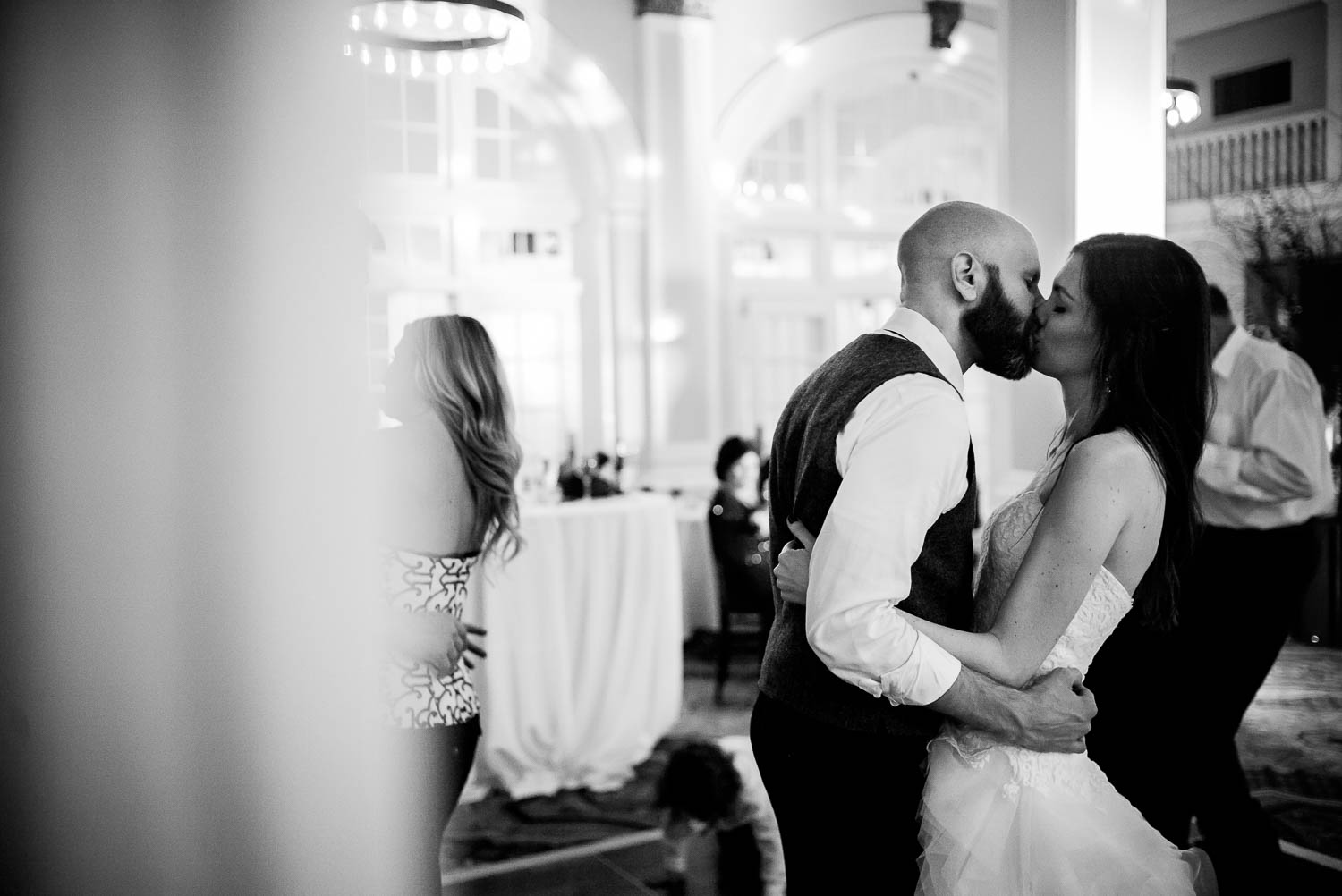 A kiss during the last dance at wedding reception hotel-galvez-wedding-philip-thomas-photography