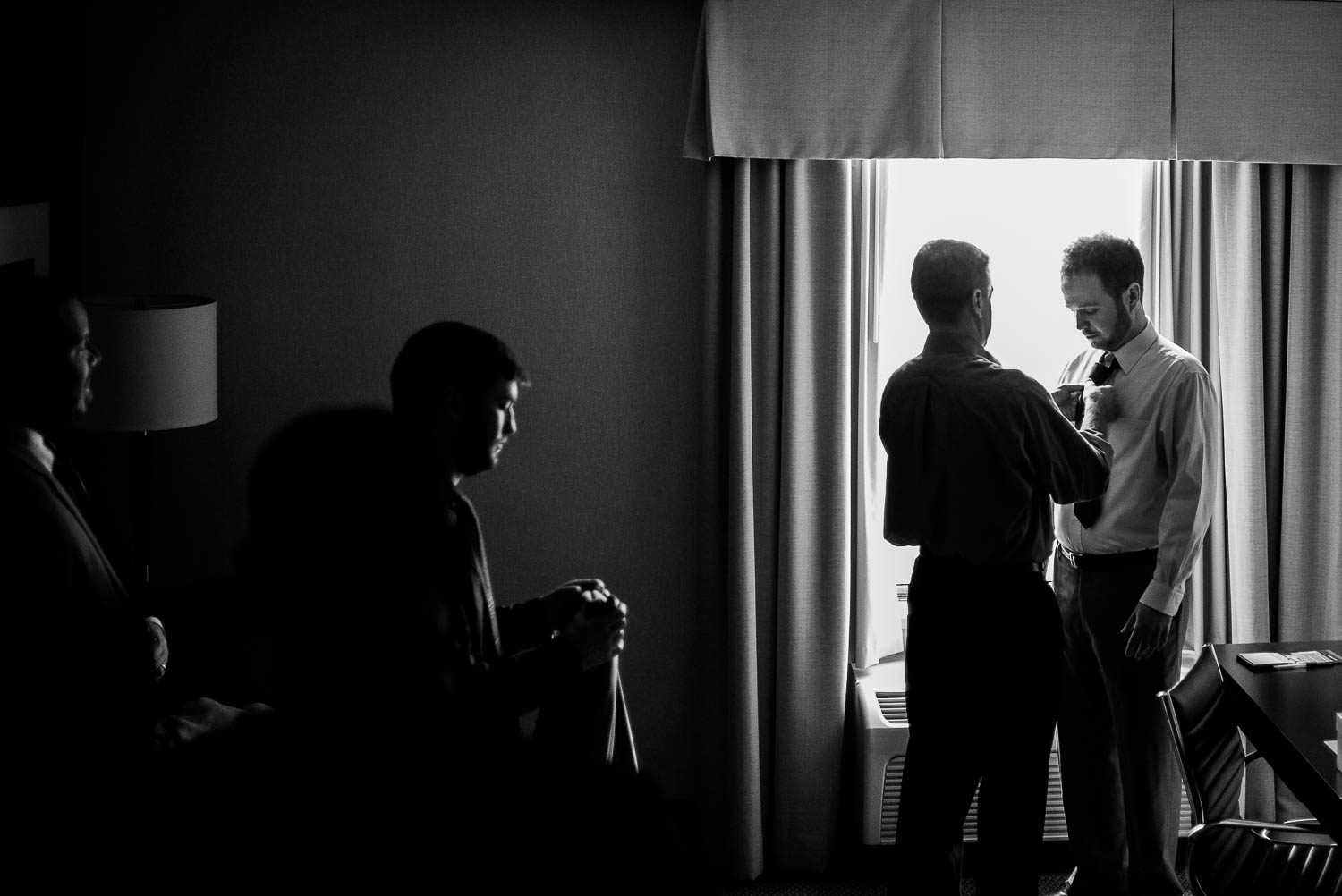 Goom has his tie fixed by father in pre wedding in a Silver Spring hotel Washington DC