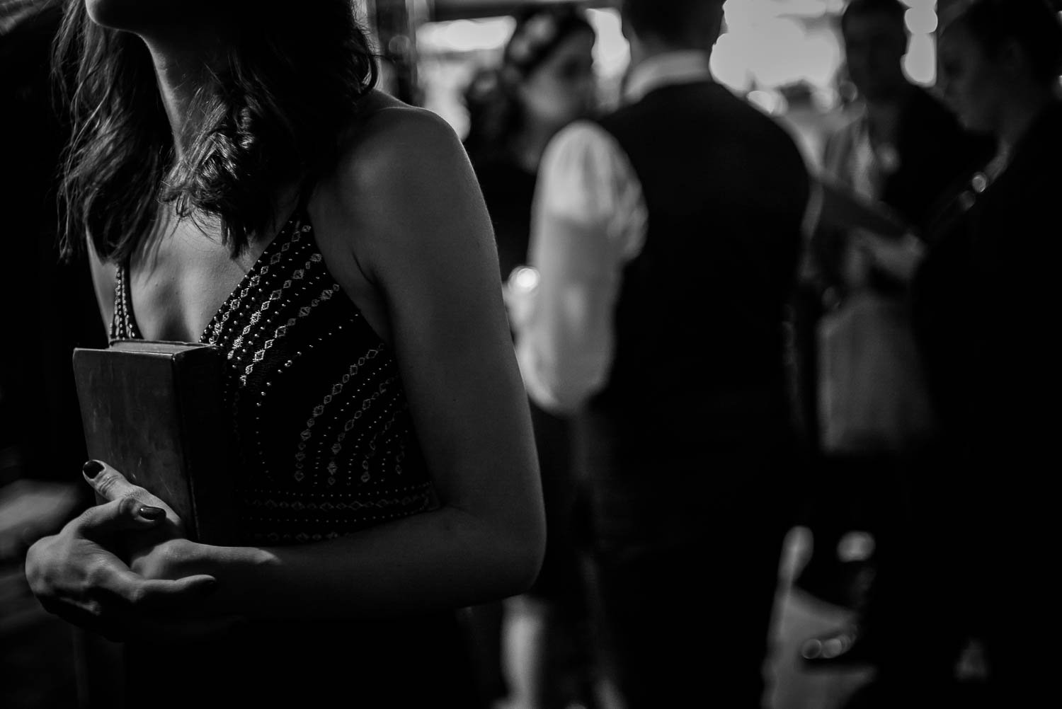 A girl holds a book pre-ceremony at Takoma Park Washington D.C-Leica Wedding photographer-Philip Thomas