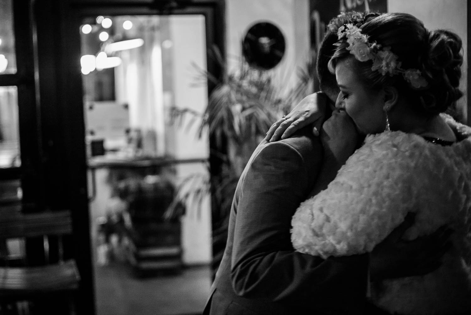 Moments after tying the knot couple embrace in quiet moment at Republic Takoma Park Washington D.C-Leica Wedding photographer-Philip Thomas