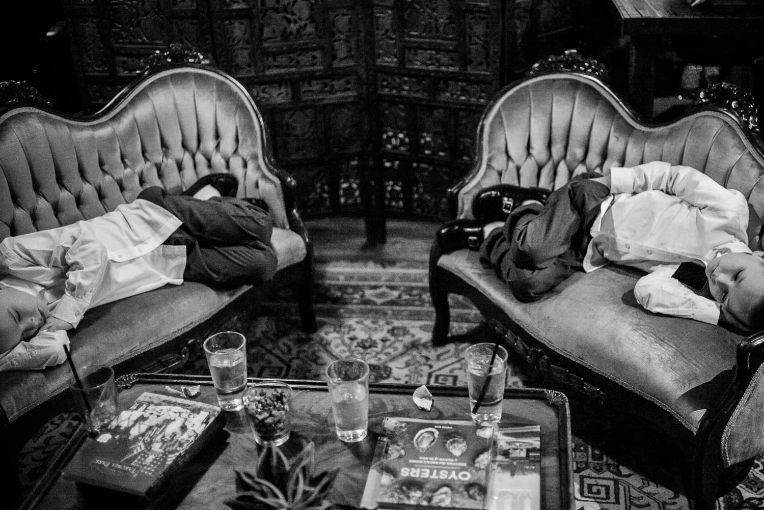 Symmetrical images of boys fallen asleep at a late winter wedding reception Republic restaurant Takoma Park Washington D.C-Leica Wedding photographer-Philip Thomas