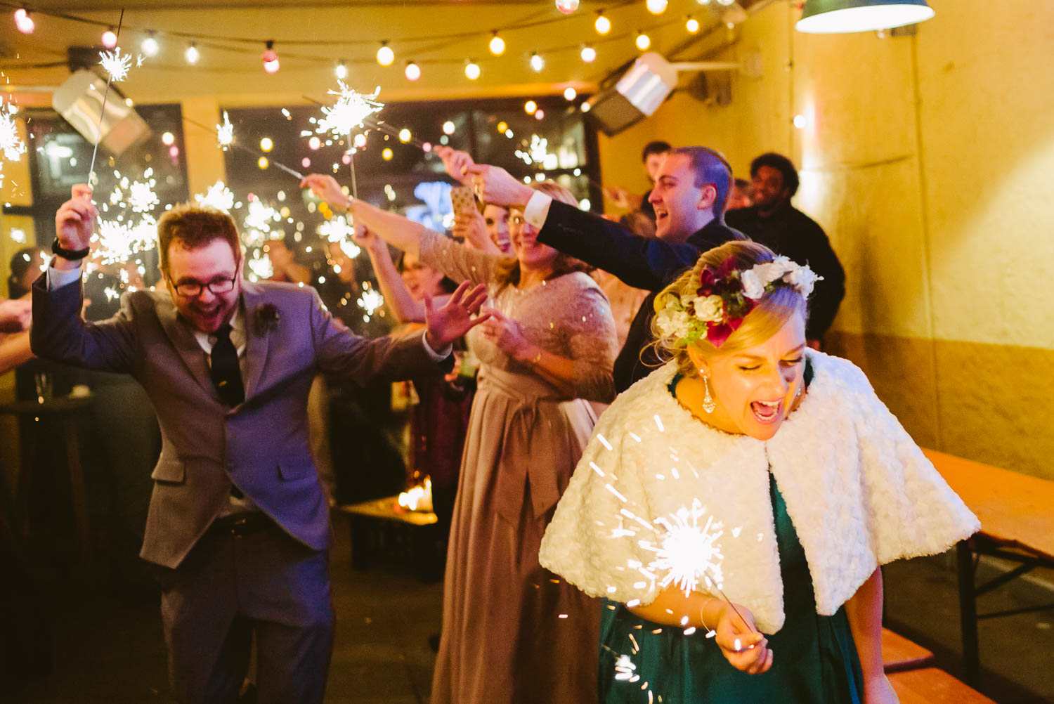 Couple laugh hysterically as depart sparklers send off at Republic Takoma Park Washington D.C-Leica Wedding photographer-Philip Thomas