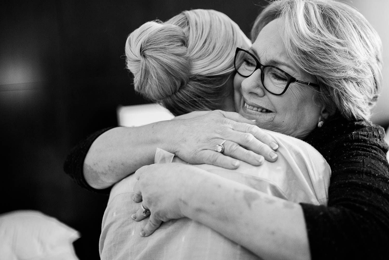 Mother and bride hug closeup