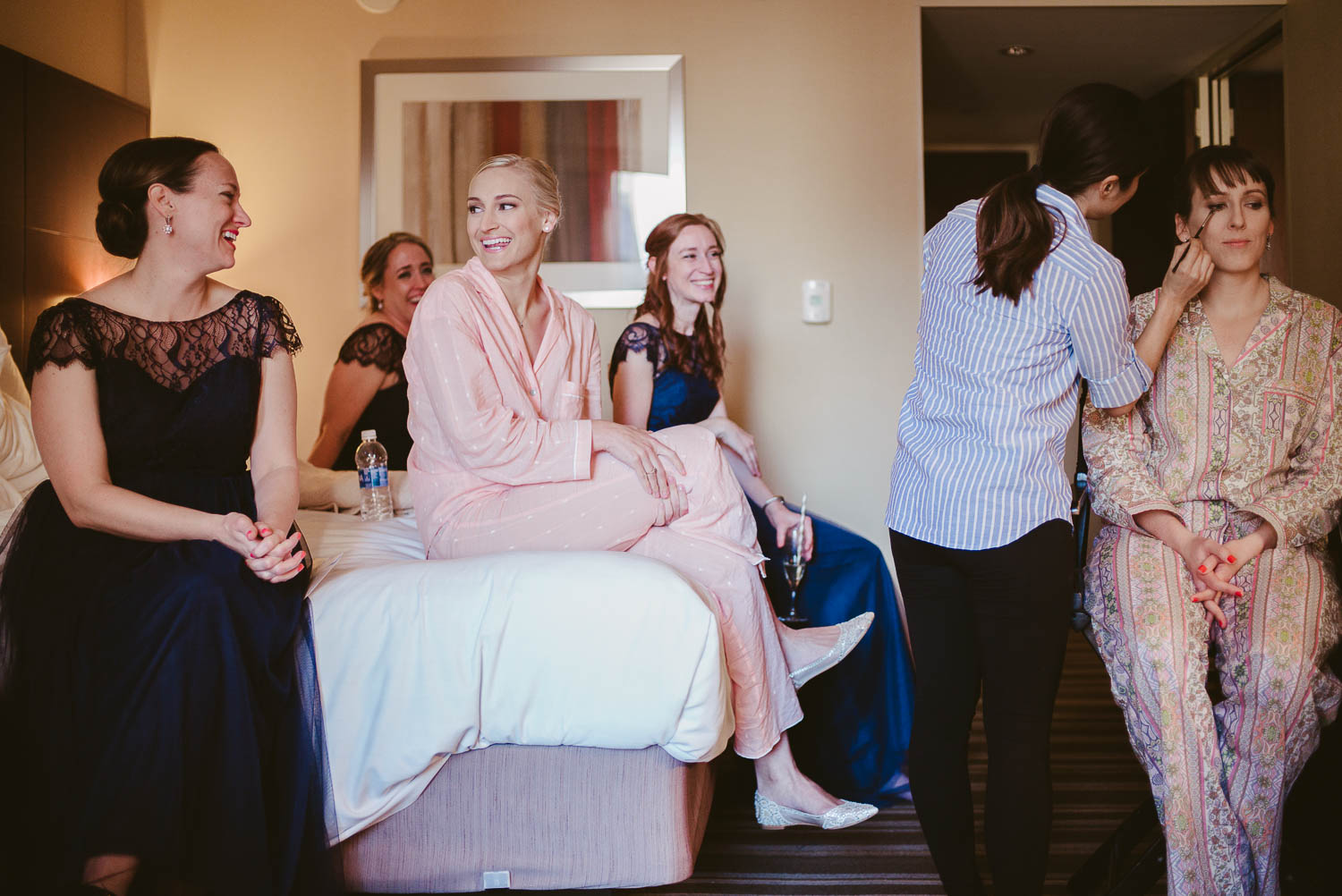 Four sisters share a joke at a wedding day Hyatt Regency Houston, Texas.