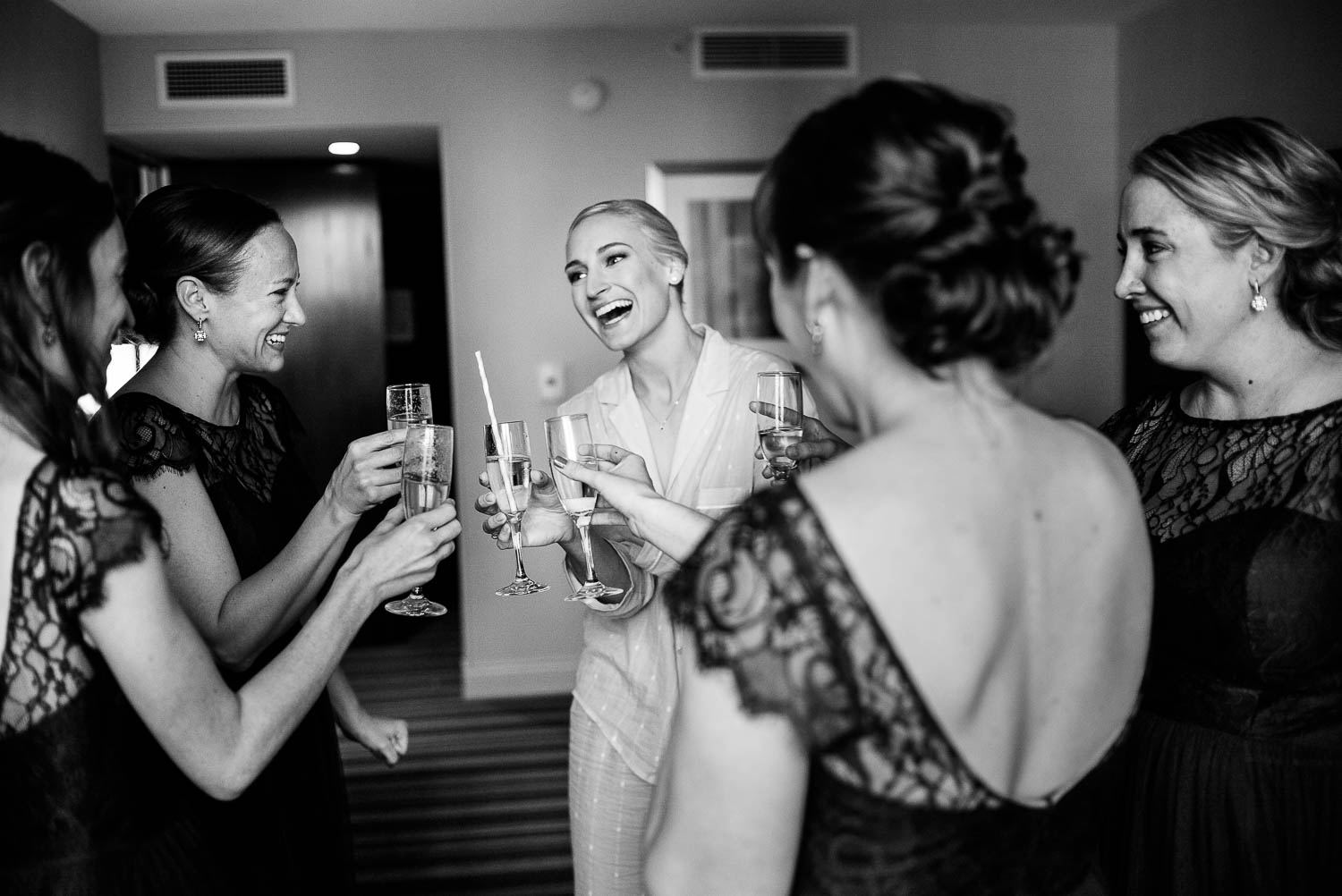 Bride and sisters toast for the wedding at Hyatt Regency Houston, Texas.