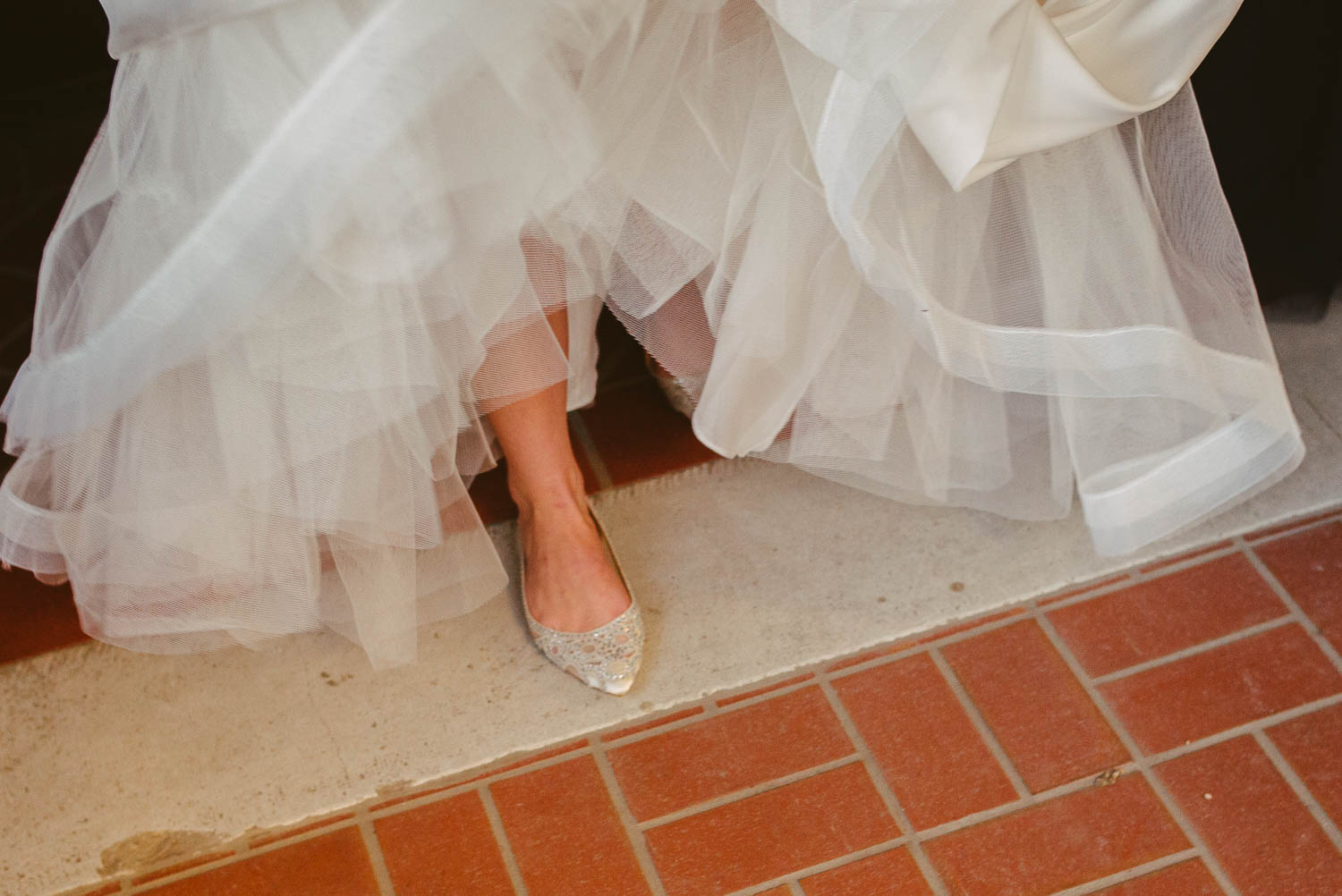 Brides shoe shown as she walks at United Methodist Church, Huston Texas