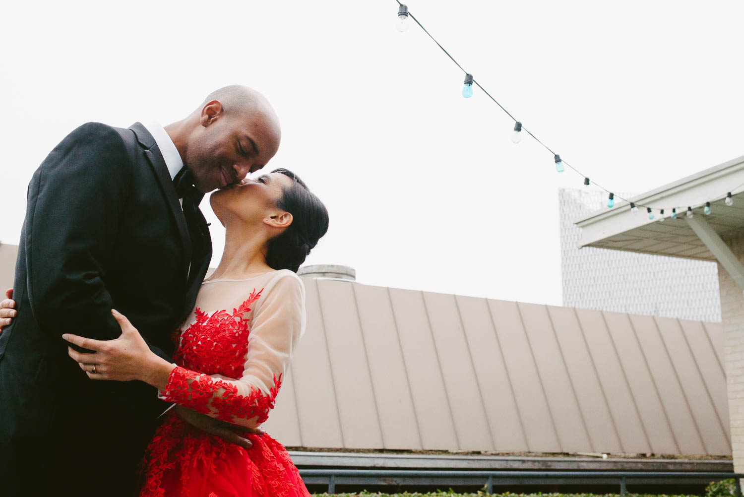 Couple kiss after first look at Hotel Havana -Leica photographer-Philip Thomas Photography