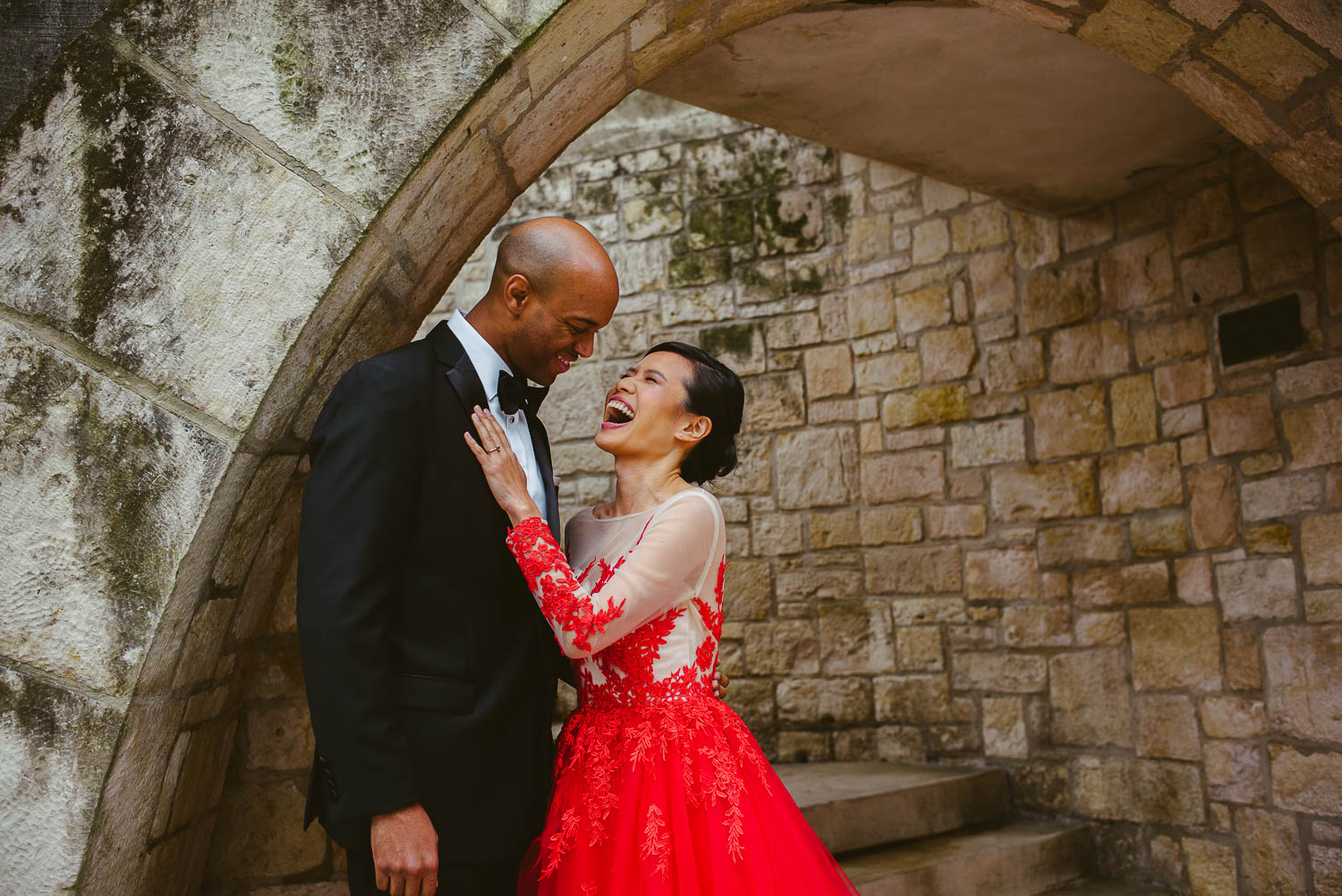 Couple share a candid moment of joy along San Antonio riverwalk near Hotel Havana -Leica photographer-Philip Thomas Photography