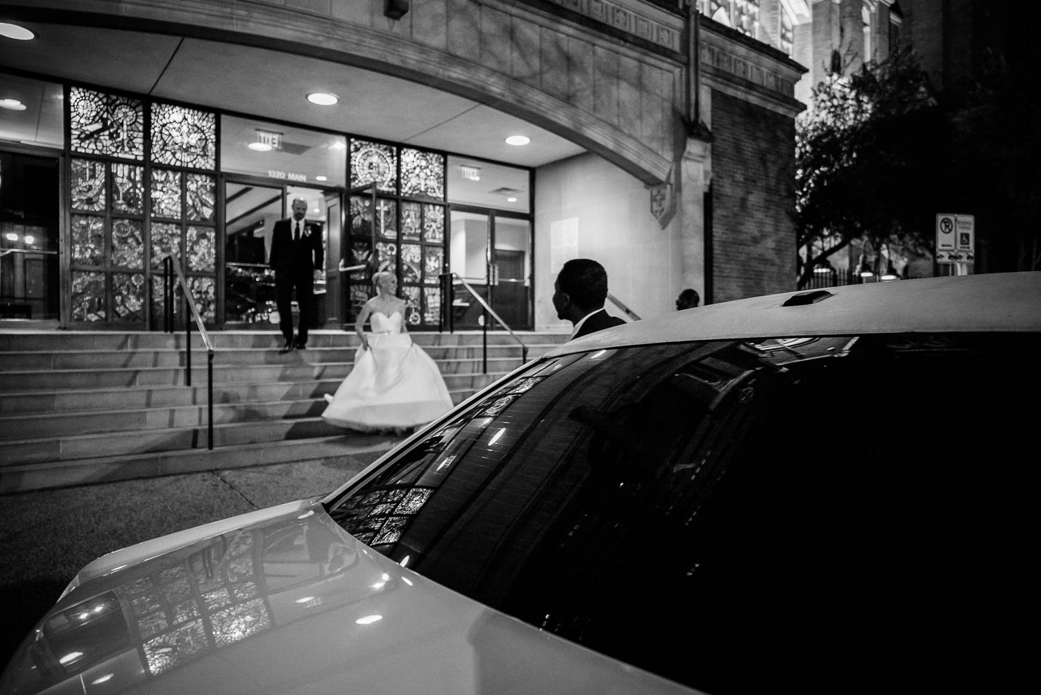 Wed couple departing irst United Methodist Church Wedding Houston to limo