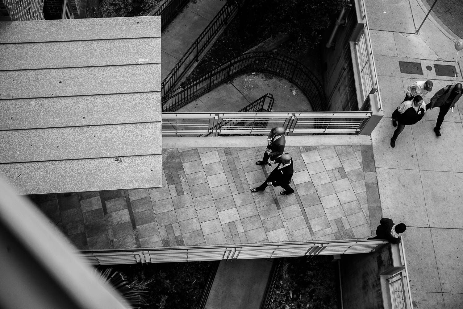 A shot from above looking down as grrom arrives to wedding ceremony at La Orilla Del Rio Ballroom-Leica photographer-Philip Thomas Photography