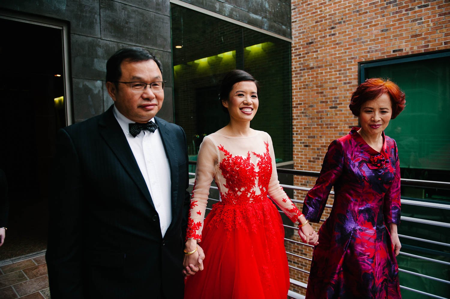 Bride enters wedding ceremony with Taiwan parents at La Orilla Del Rio Ballroom-Leica photographer-Philip Thomas Photography