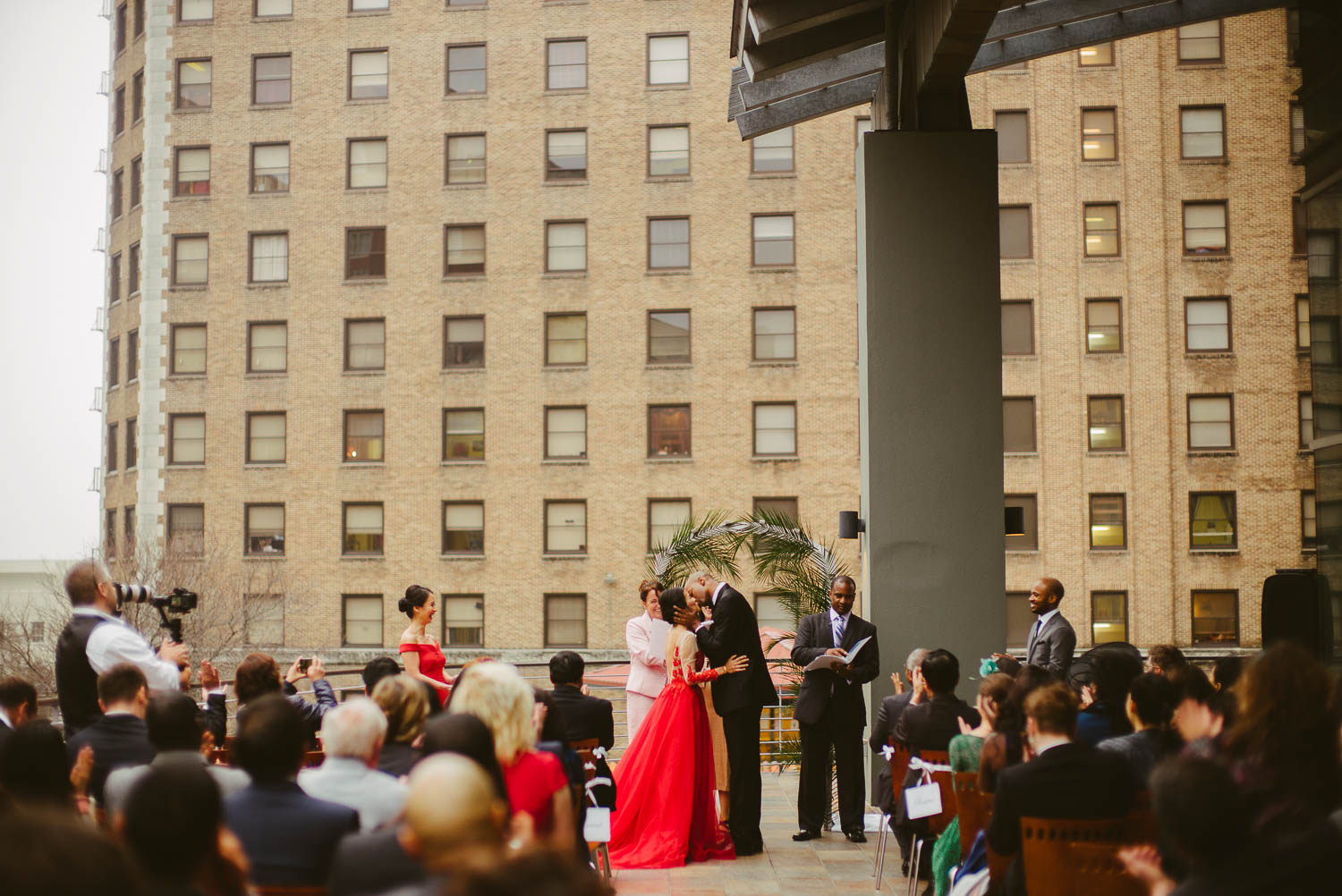 Couple kiss as they marry at La Orilla Del Rio Ballroom-Leica photographer-Philip Thomas Photography