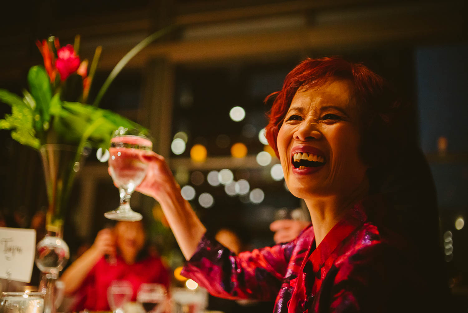 Mother of the bride toasts the couple as she shows a joyful moment at La Orilla Del Rio Ballroom-Leica photographer-Philip Thomas Photography