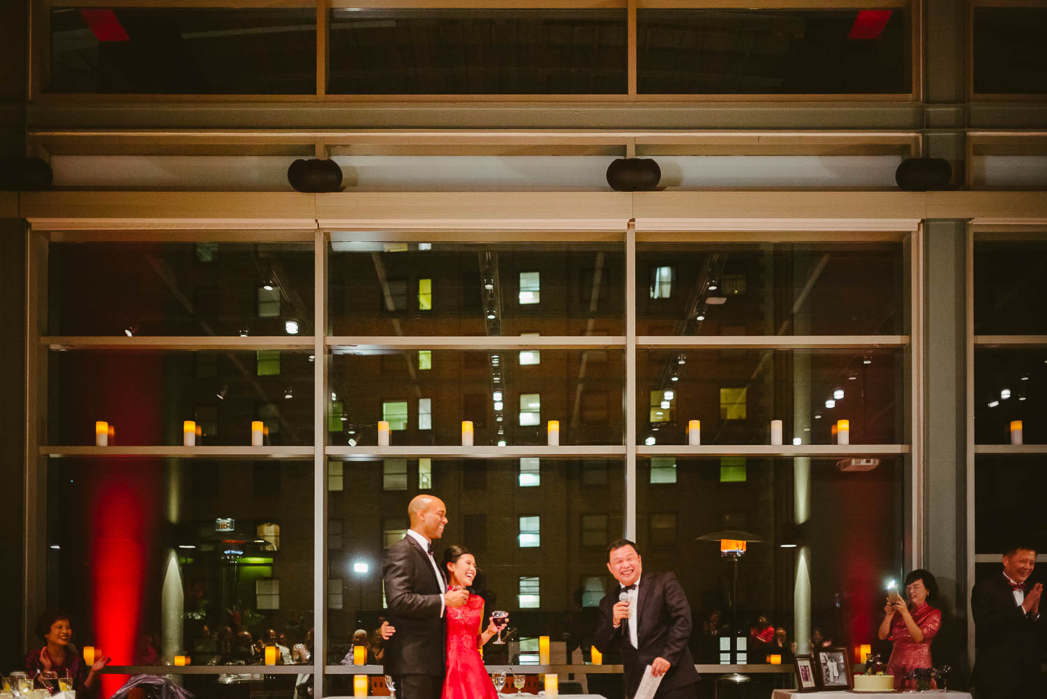 Father of the bride share a joke with the couple at La Orilla Del Rio Ballroom-Leica photographer-Philip Thomas Photography