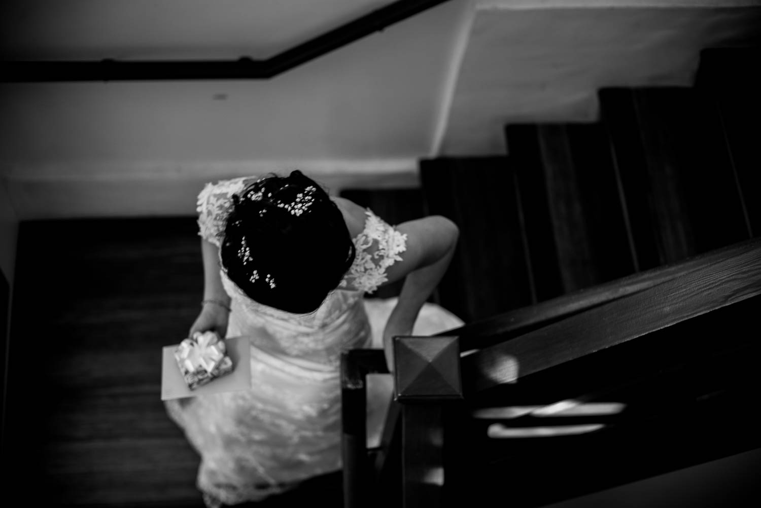 Bride climbs stairwell at 1909 Topanga California Wedding