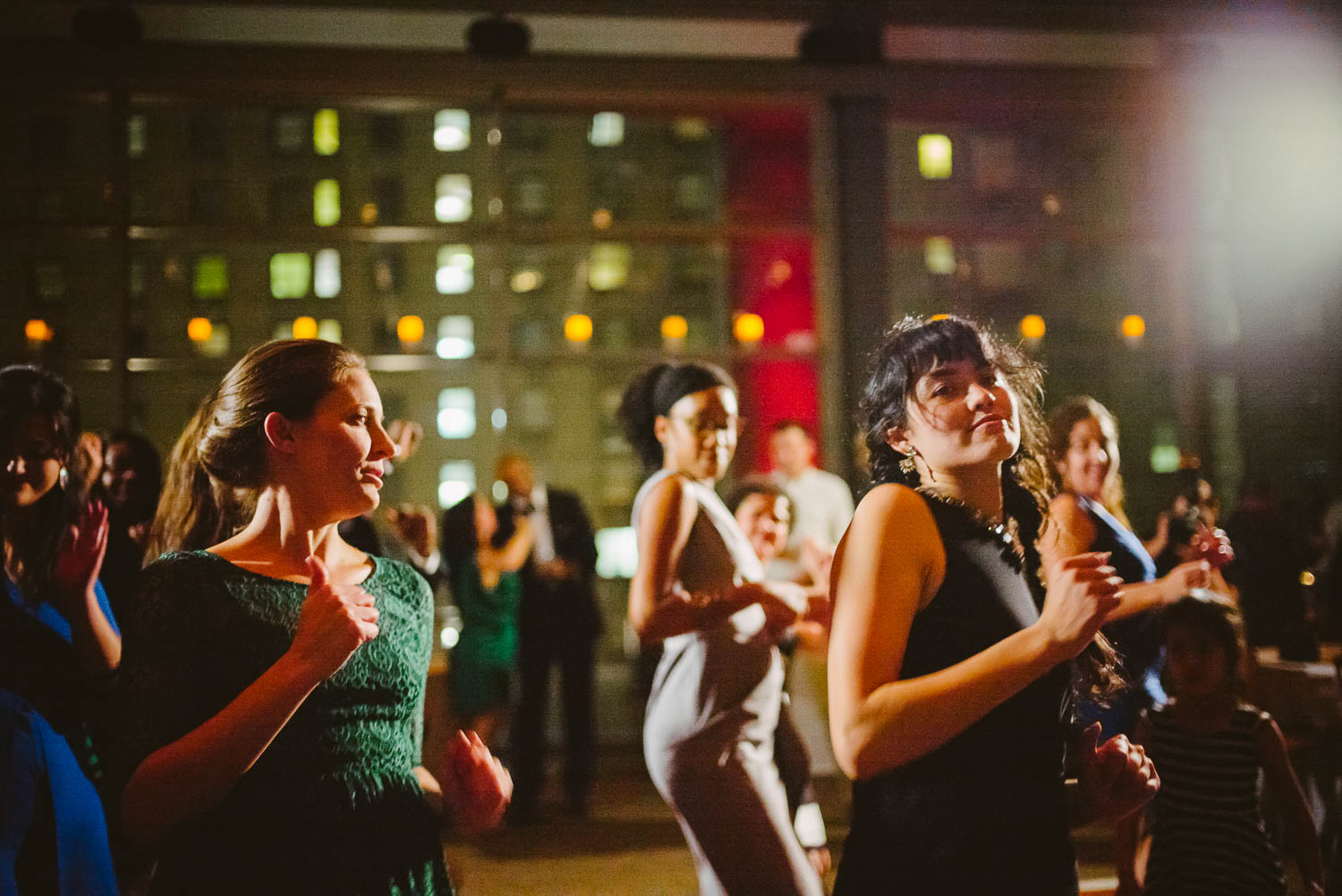 Girls dance on reception dancefloor ar La Orilla Del Rio Ballroom-Leica photographer-Philip Thomas Photography