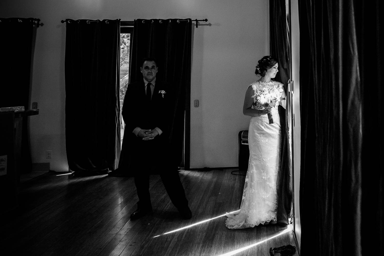 Father of the bride readies to escort the bride at 1909 Topanga California Wedding