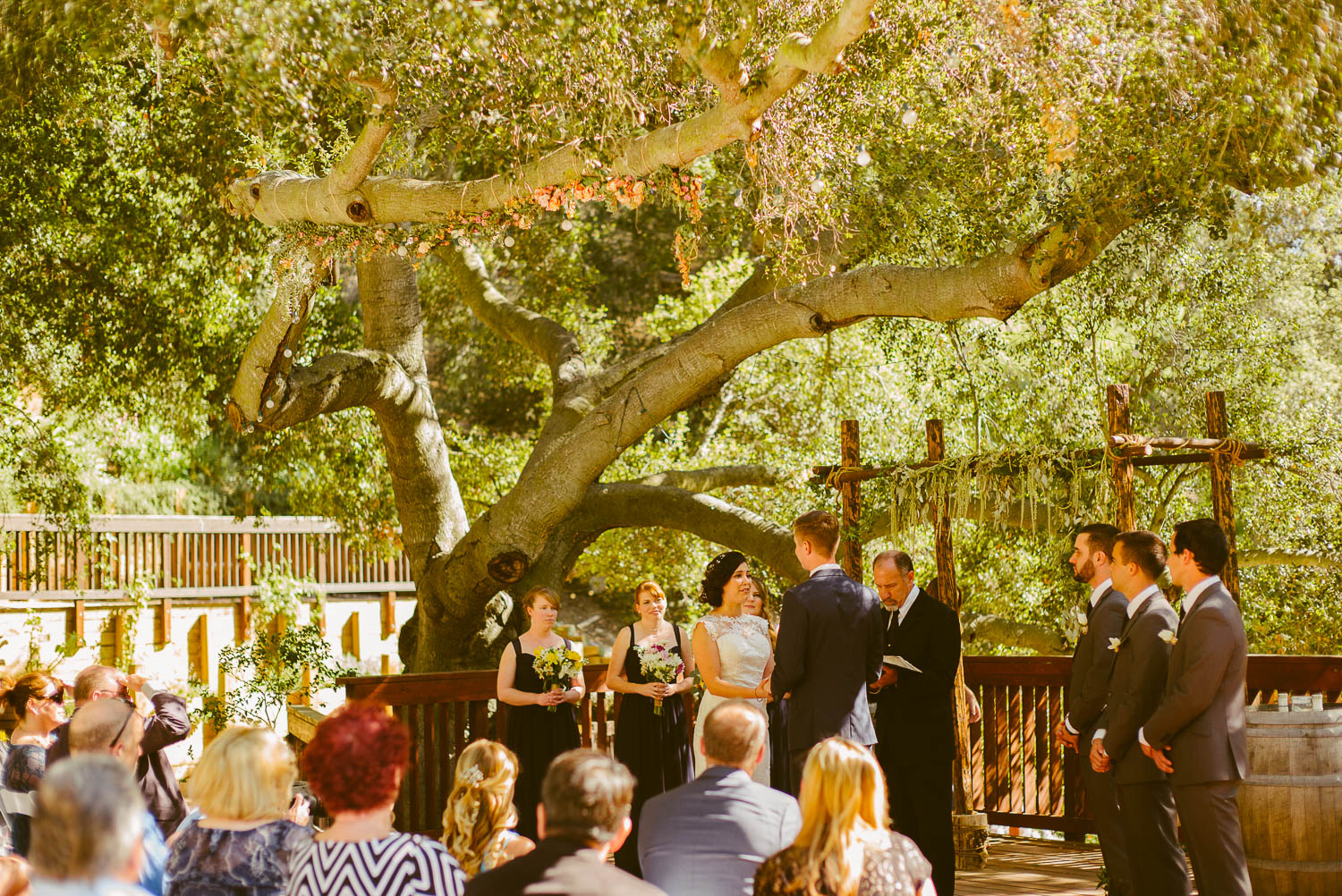 Groom and bride face each other during wedding ceremony at 1909 Topanga California Wedding-Leica-Philip Thomas