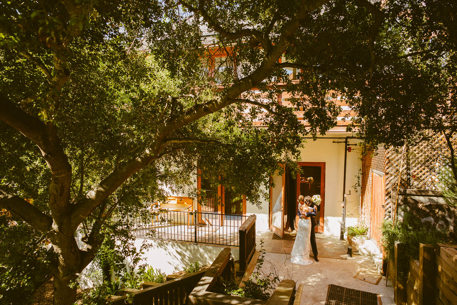 Bride and groom embrace after tying the knot at 1909 Topanga California Wedding-Leica-Philip Thomas