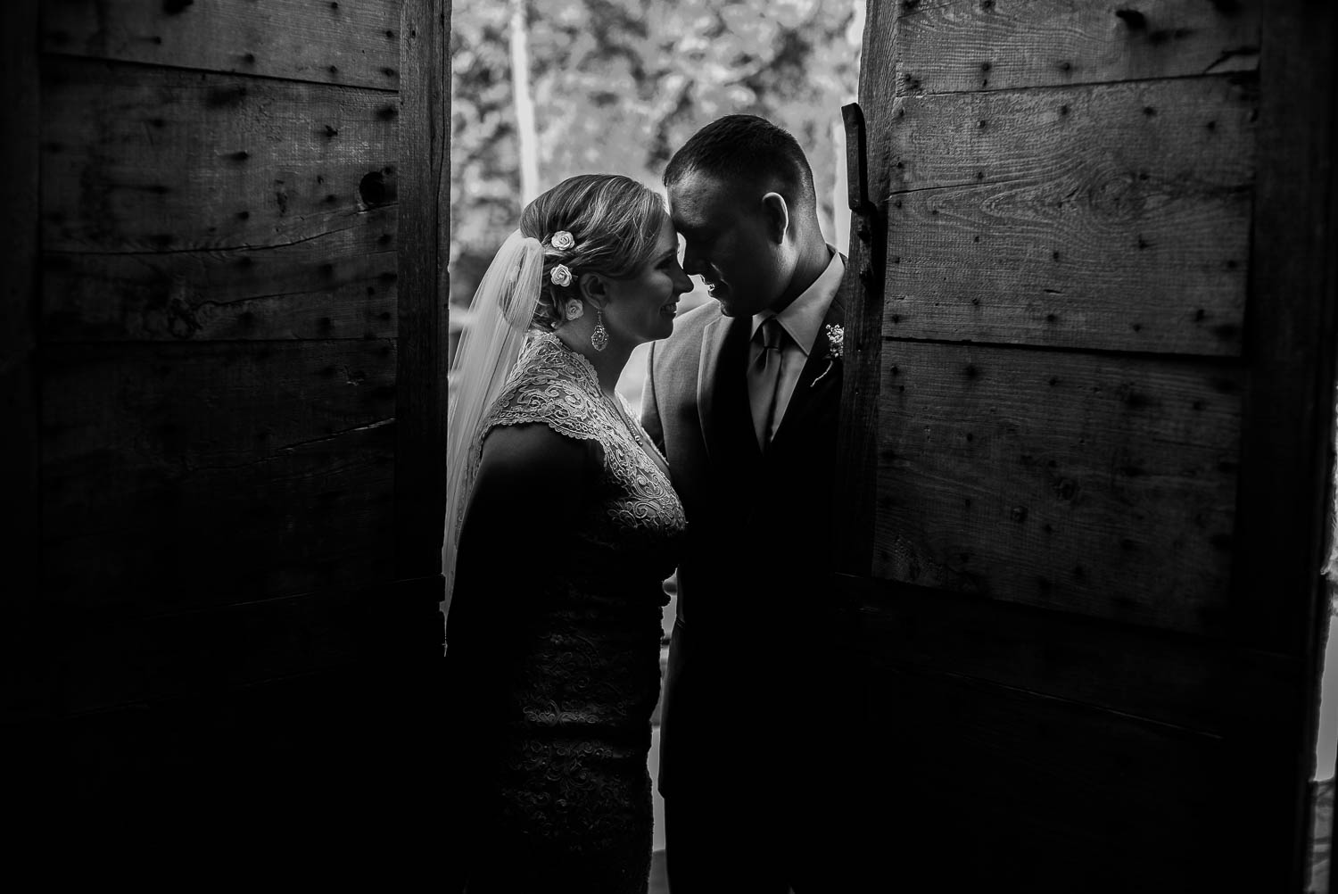 Wedding couple in an adobe building at The Witte Museum Wedding San Antonio Texas