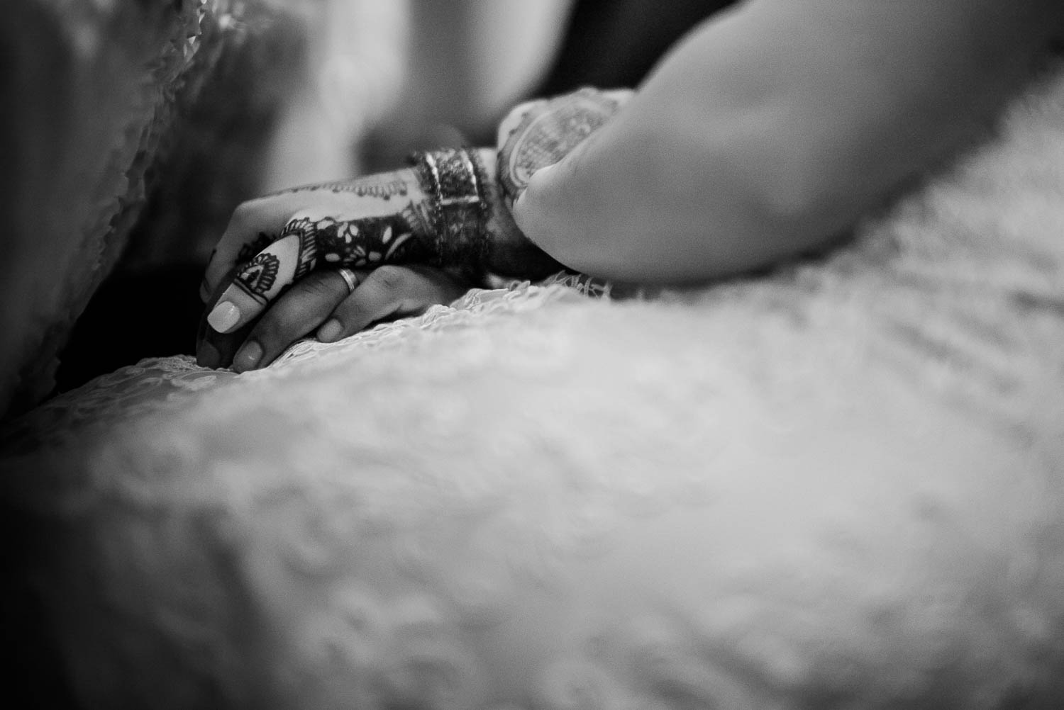 Groom and bride hold hands during toasts at The-Witte_Museum-Leica-wedding-photographer-Philip Thomas Photography