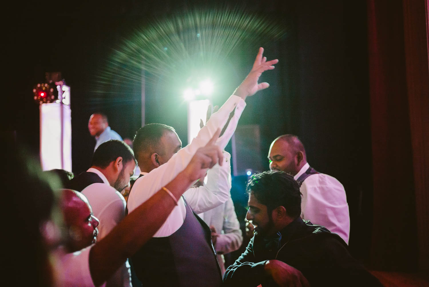 A mixture of Jamaican and Guyanan music as wedding reception guests dance at The-Witte_Museum-Leica-wedding-photographer-Philip Thomas Photography