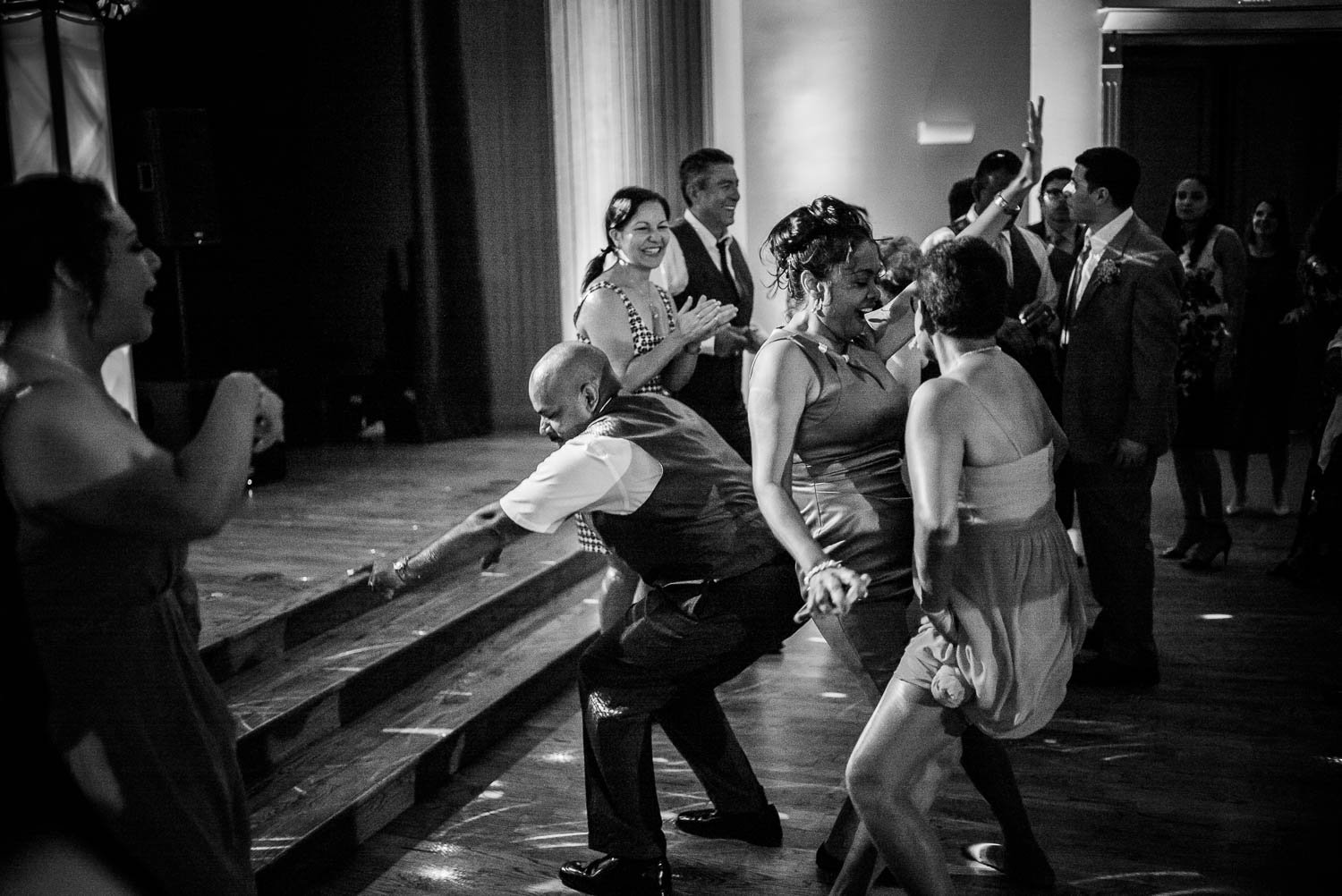 Guest dance A mixture of Jamaican and Guyanan music as wedding reception guests dance at The-Witte_Museum-Leica-wedding