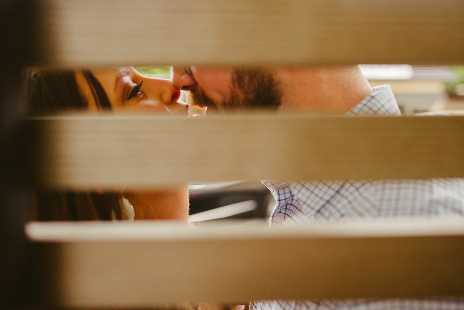 San Jose Hotel captured through gate slats Austin Engagement Downtown