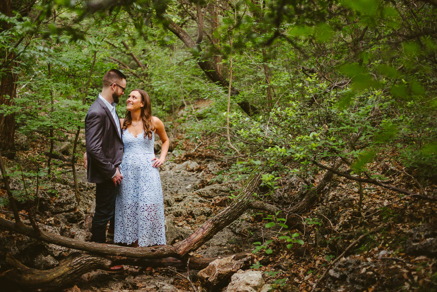 Ashley and Fred in wooded area at Balcones District Park Engagement Session