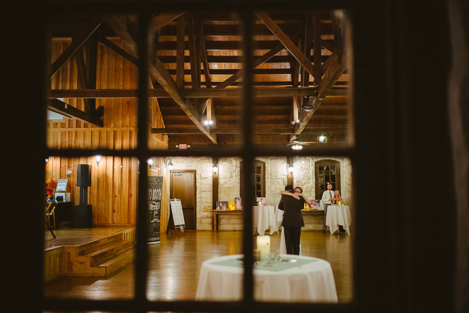 Couple dancing through window pane at Pecan Springs Houston Texas photo by Philip Thomas Photography