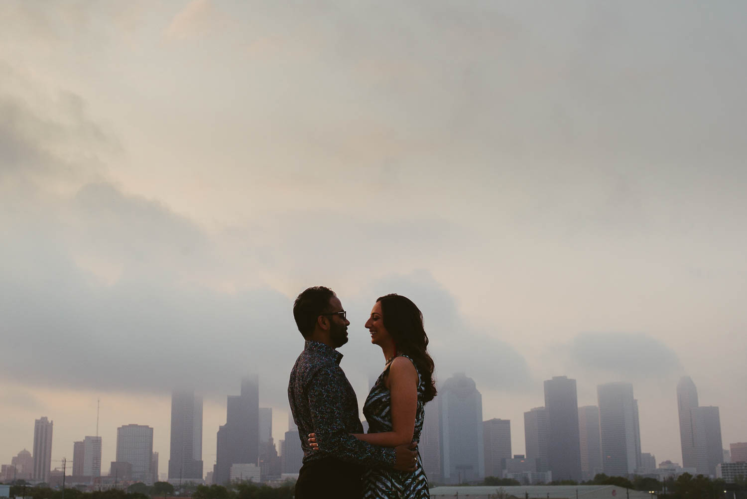 Early sunrise light on rooftop with Houston skyline The Astorian Texas