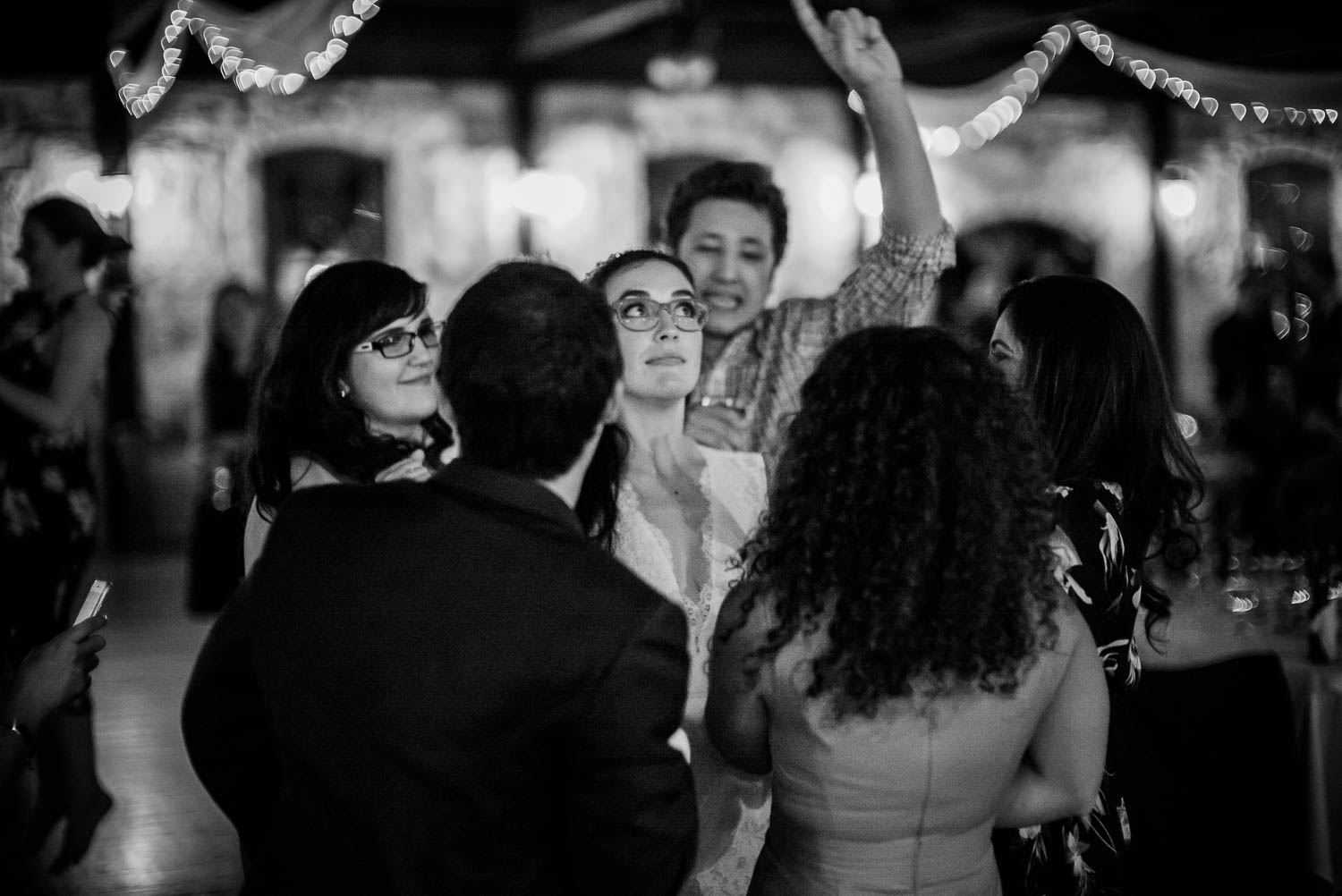 Bride dances surrounded by friends and family Pecan Springs Houston Texas photo by Philip Thomas Photography